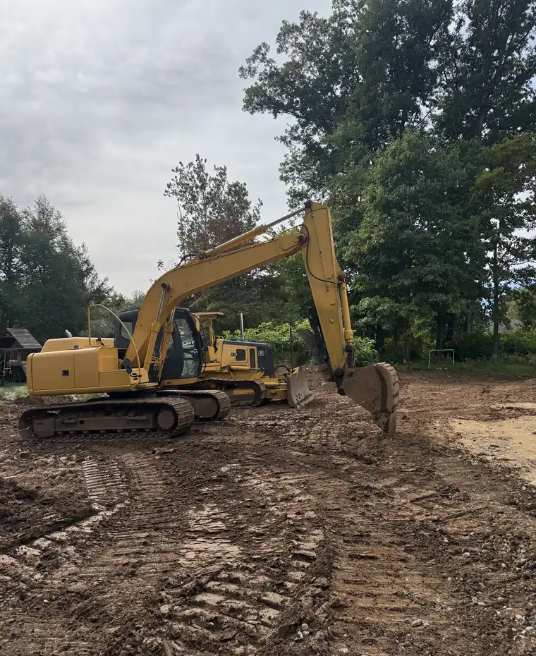 Excavator working a lot for site preparation — excavation contractor near me